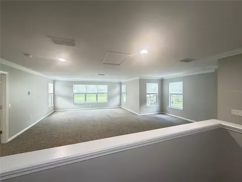 Living - 3410 Starbird Dr, Ocoee, FL 34761 photo 9 of 12