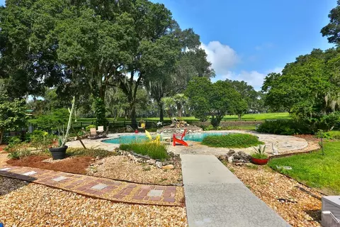 Exterior - 13450 NW Gainesville Rd, Reddick, FL 32686 photo 9 of 22