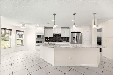 Kitchen - 9452 SW 93rd Loop, Ocala, FL 34481 photo 3 of 7