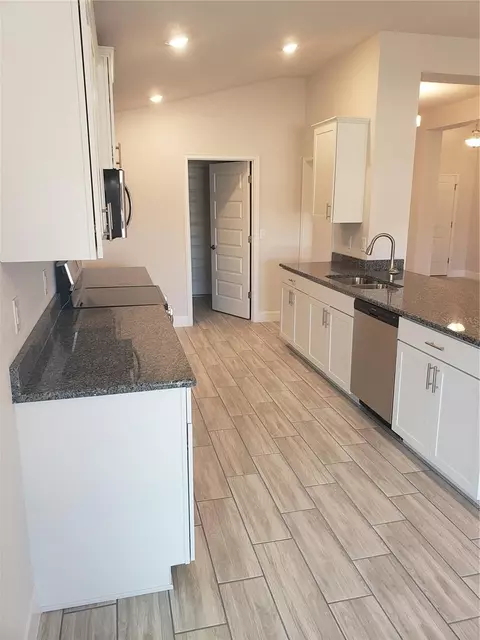 Kitchen - 4866 Sutherland St #LOT 62, Spring Hill, FL 34609 photo 2 of 2