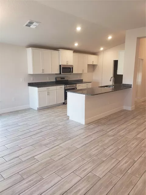 Kitchen - 4866 Sutherland St #LOT 62, Spring Hill, FL 34609 photo 1 of 2