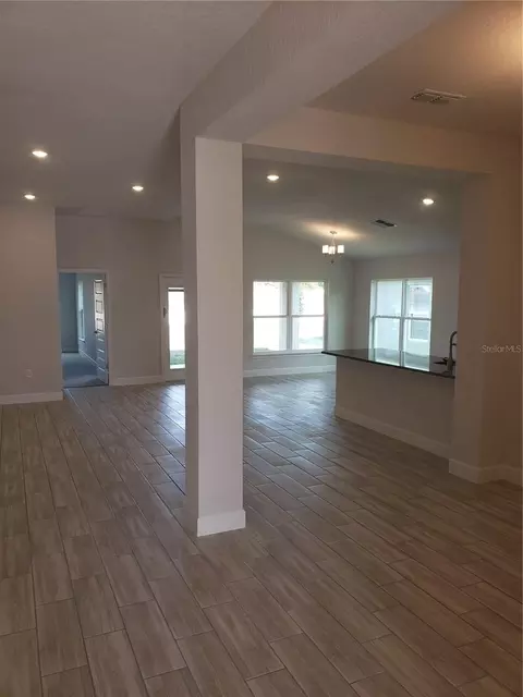 Living - 4866 Sutherland St #LOT 62, Spring Hill, FL 34609 photo 1 of 3