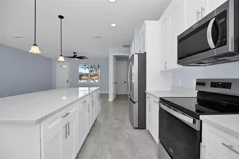 Kitchen - 7604 SW 103rd Loop, Ocala, FL 34476 photo 3 of 4