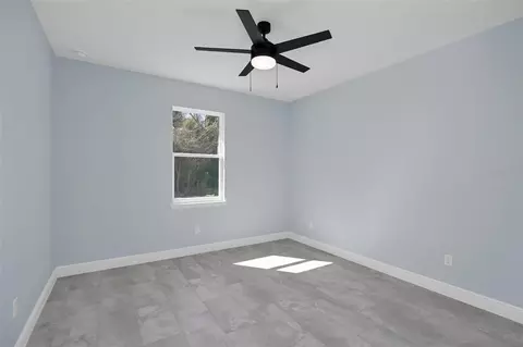 Bedroom - 7604 SW 103rd Loop, Ocala, FL 34476 photo 2 of 2