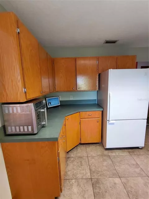 Kitchen - 33 Pine Trace Crse, Ocala, FL 34472 photo 3 of 8