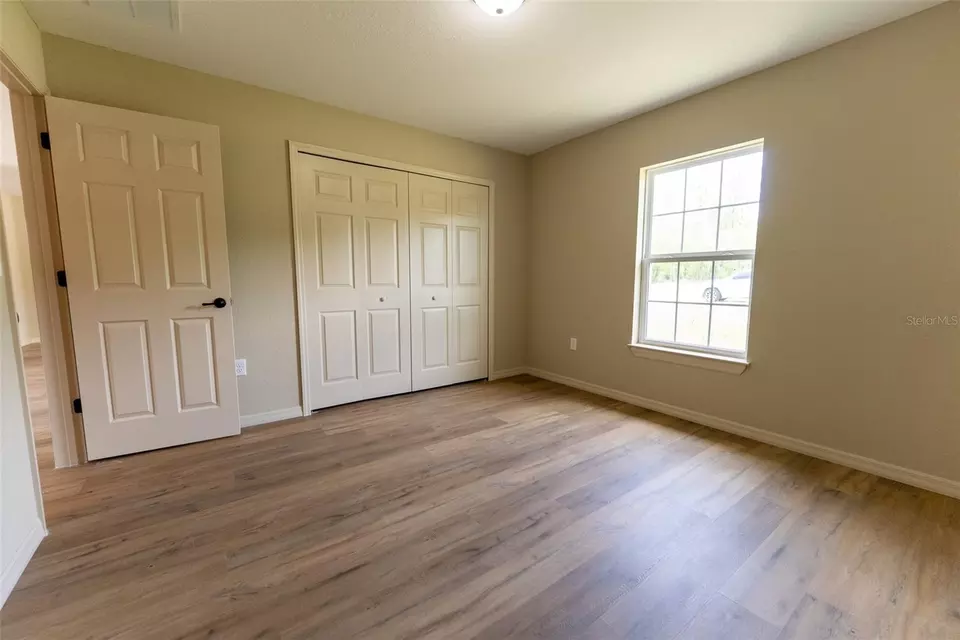 Bedroom - 148 Dogwood Drive Cir, Ocala, FL 34472 photo 7 of 15