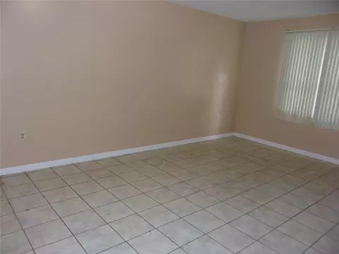 Living - 5700 NE 6th Pl, Ocala, FL 34470 photo 2 of 3