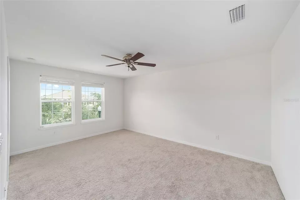 Bedroom - 5716 SW 50th Ave, Ocala, FL 34474 photo 2 of 7