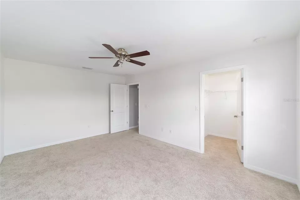 Bedroom - 5716 SW 50th Ave, Ocala, FL 34474 photo 3 of 7