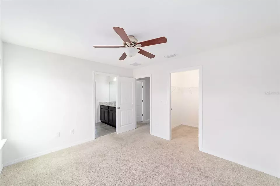 Bedroom - 5716 SW 50th Ave, Ocala, FL 34474 photo 5 of 7