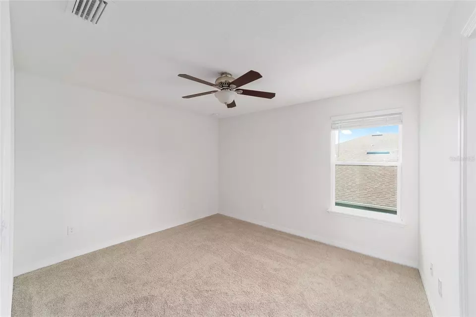 Bedroom - 5716 SW 50th Ave, Ocala, FL 34474 photo 4 of 7