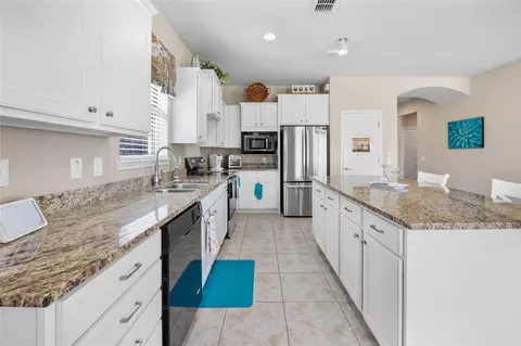 Kitchen - 10074 SW 77th Loop, Ocala, FL 34481 photo 3 of 4