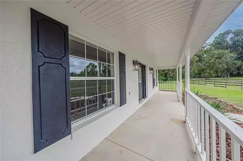 Exterior - 12615 NW Gainesville Rd, Reddick, FL 32686 photo 2 of 18