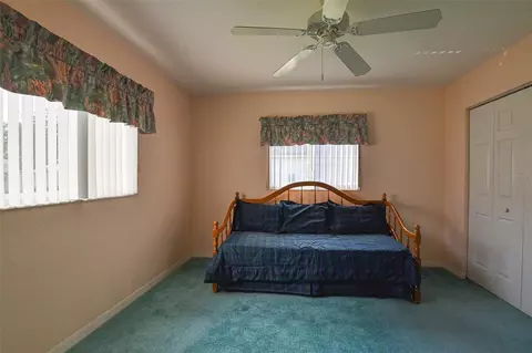 Bedroom - 9033 SE 135th Loop, Summerfield, FL 34491 photo 2 of 9