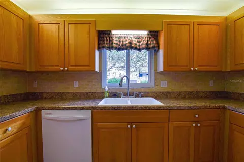 Kitchen - 9033 SE 135th Loop, Summerfield, FL 34491 photo 5 of 6