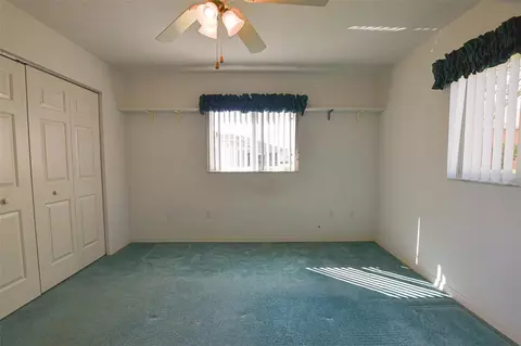 Bedroom - 9033 SE 135th Loop, Summerfield, FL 34491 photo 6 of 9