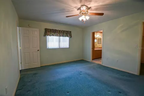 Bedroom - 9033 SE 135th Loop, Summerfield, FL 34491 photo 9 of 9