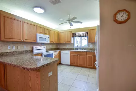 Kitchen - 9033 SE 135th Loop, Summerfield, FL 34491 photo 1 of 6