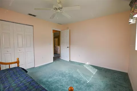 Bedroom - 9033 SE 135th Loop, Summerfield, FL 34491 photo 3 of 9