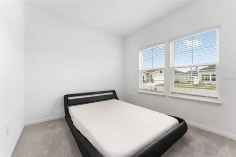 Bedroom - 7755 SW 74th Loop, Ocala, FL 34481 photo 3 of 5