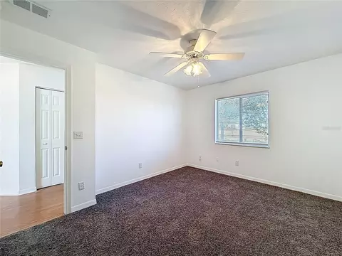 Bedroom - 6175 SW 98th Loop, Ocala, FL 34476 photo 2 of 9