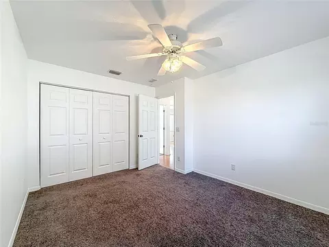 Bedroom - 6175 SW 98th Loop, Ocala, FL 34476 photo 3 of 9