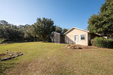 Exterior - 11715 NW 90th Ave, Reddick, FL 32686 photo 12 of 28
