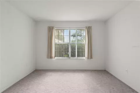 Bedroom - 7734 SW 114th Loop, Ocala, FL 34476 photo 3 of 4