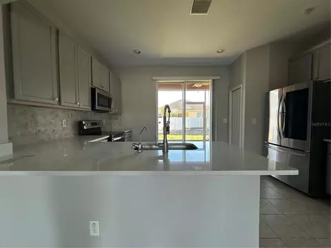Kitchen - 6950 Towering Spruce Dr, Riverview, FL 33578 photo 1 of 4