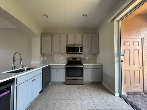 Kitchen - 6950 Towering Spruce Dr, Riverview, FL 33578 photo 2 of 4