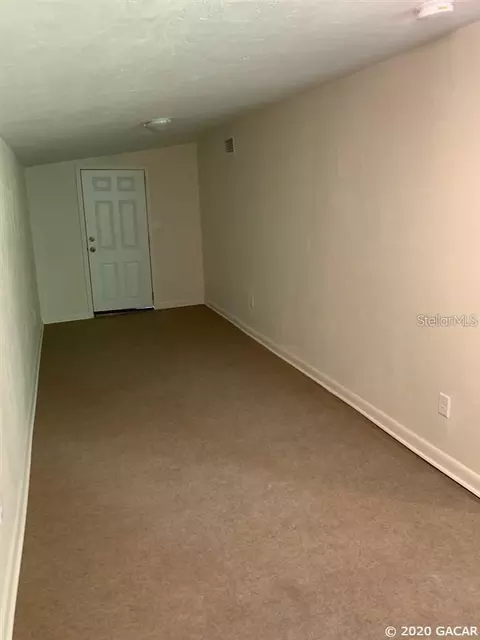 Living - 15-17 SE 2nd Ave, Williston, FL 32696 photo 2 of 5