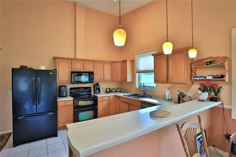 Kitchen - 9549 NW 80th Ave, Ocala, FL 34482 photo 2 of 3