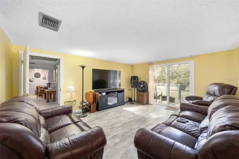 Living - 7075 SE Highway 25a, Belleview, FL 34420 photo 1 of 2