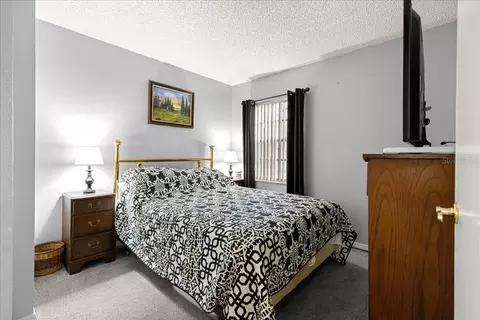 Bedroom - 7885 Midway Drive Ter #E101, Ocala, FL 34472 photo 6 of 7