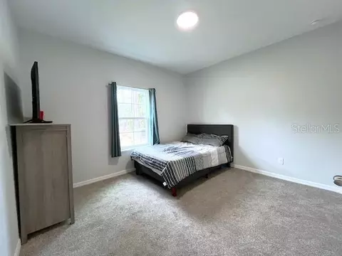 Bedroom - 900 NE 150th Ct, Williston, FL 32696 photo 4 of 7