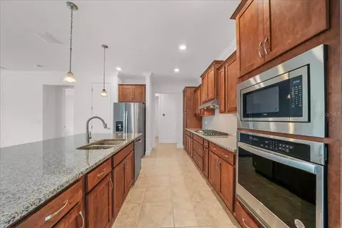 Kitchen - 10252 SW 96th Loop, Ocala, FL 34481 photo 4 of 7