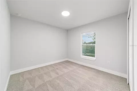 Bedroom - 15520 SW 10th Pl, Ocala, FL 34481 photo 5 of 9