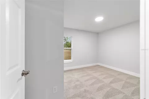 Bedroom - 15520 SW 10th Pl, Ocala, FL 34481 photo 7 of 9