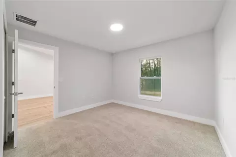 Bedroom - 15520 SW 10th Pl, Ocala, FL 34481 photo 3 of 9
