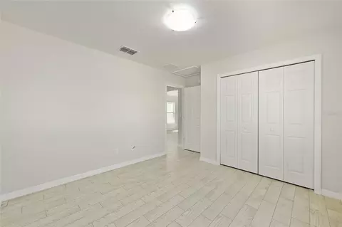 Bedroom - 49 Locust Loop Cir, Ocala, FL 34472 photo 5 of 5