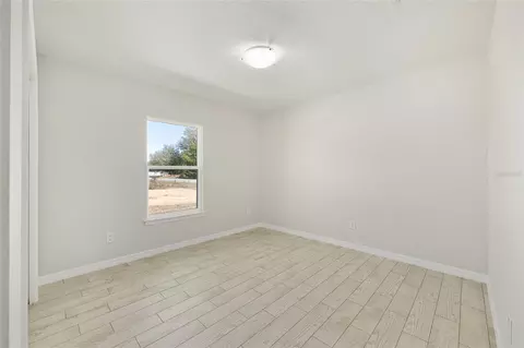 Bedroom - 49 Locust Loop Cir, Ocala, FL 34472 photo 4 of 5