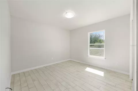 Bedroom - 49 Locust Loop Cir, Ocala, FL 34472 photo 2 of 5