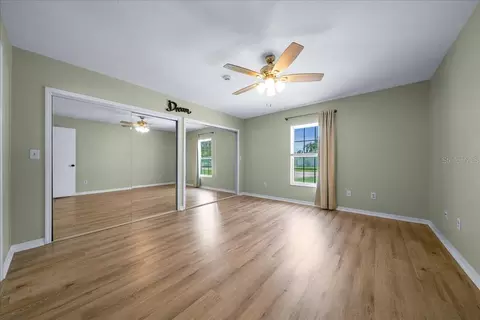 Bedroom - 685 NW 67th Pl, Ocala, FL 34475 photo 3 of 9