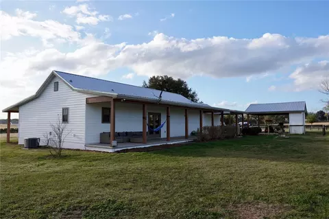 Exterior - 12895 NW Gainesville Rd, Reddick, FL 32686 photo 4 of 11