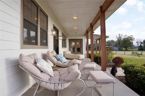 Exterior - 12895 NW Gainesville Rd, Reddick, FL 32686 photo 5 of 11
