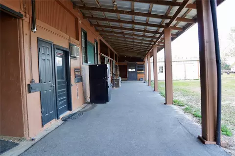 Exterior - 12895 NW Gainesville Rd, Reddick, FL 32686 photo 8 of 11