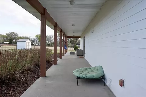 Exterior - 12895 NW Gainesville Rd, Reddick, FL 32686 photo 7 of 11