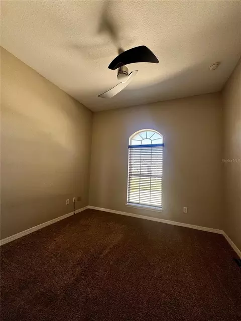 Bedroom - 6260 SW 90th St, Ocala, FL 34476 photo 3 of 11
