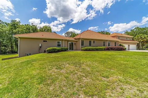 Exterior - 2380 SE 73rd Loop, Ocala, FL 34480 photo 13 of 14