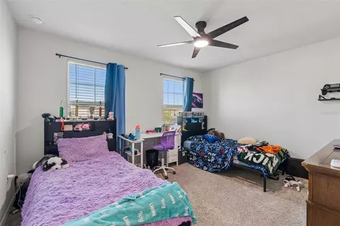 Bedroom - 7604 Pool Compass Loop, Wesley Chapel, FL 33545 photo 6 of 13